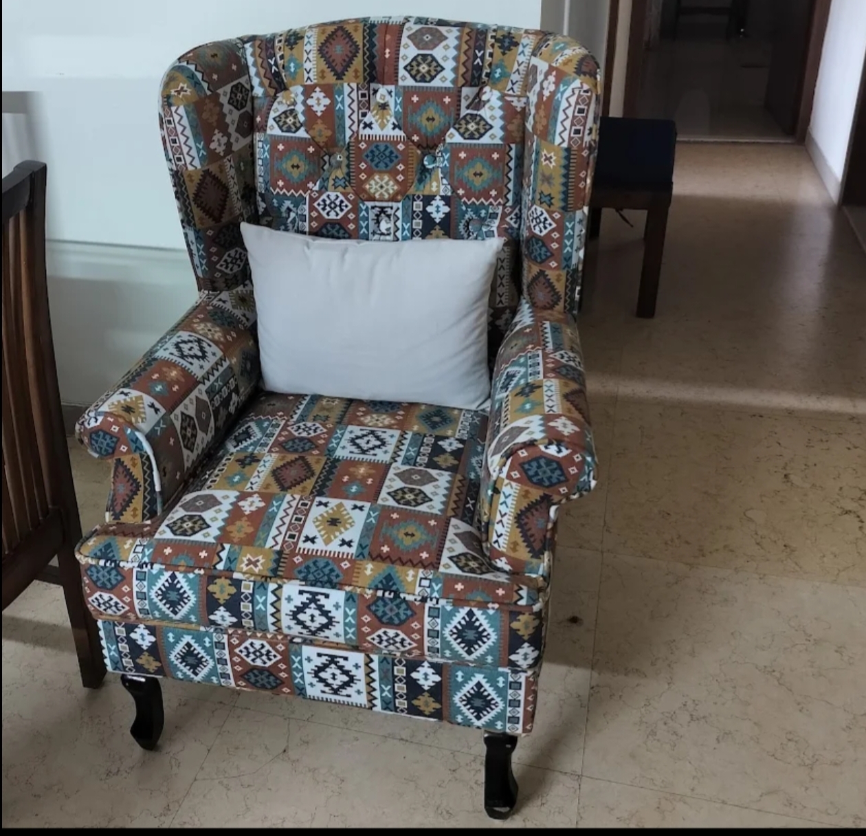 Handmade wingback chair with aztec print upholstery